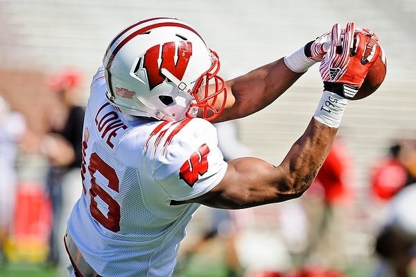 Badger wide receiver Reggie Love catches the ball at the 2013 Spring Game.