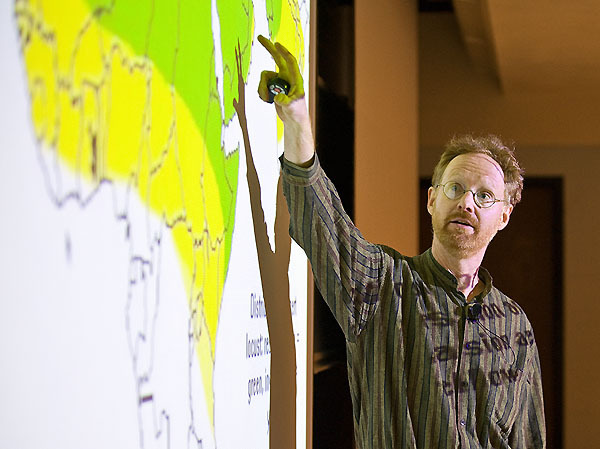 Anthony Ives, professor of zoology, gives a lecture on locust populations during a class session in 2008.