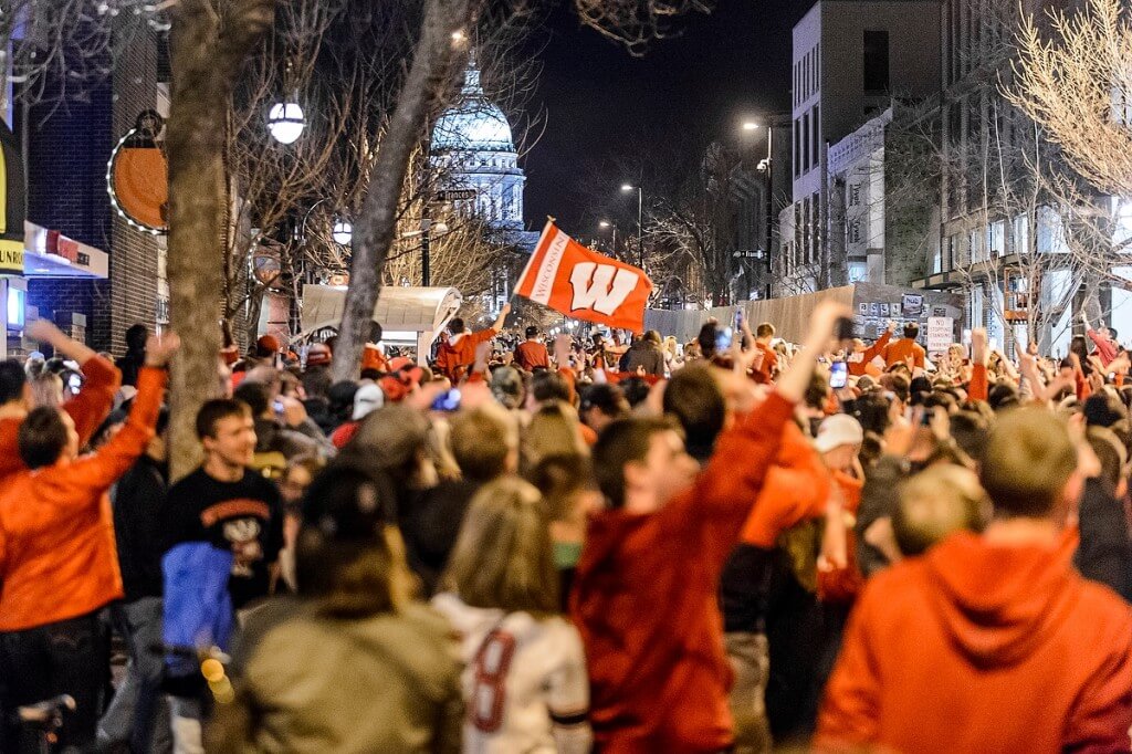 Over-the-moon fans gather on State Street to celebrate the Badgers’ win against undefeated Kentucky in the NCAA Final Four game in April.