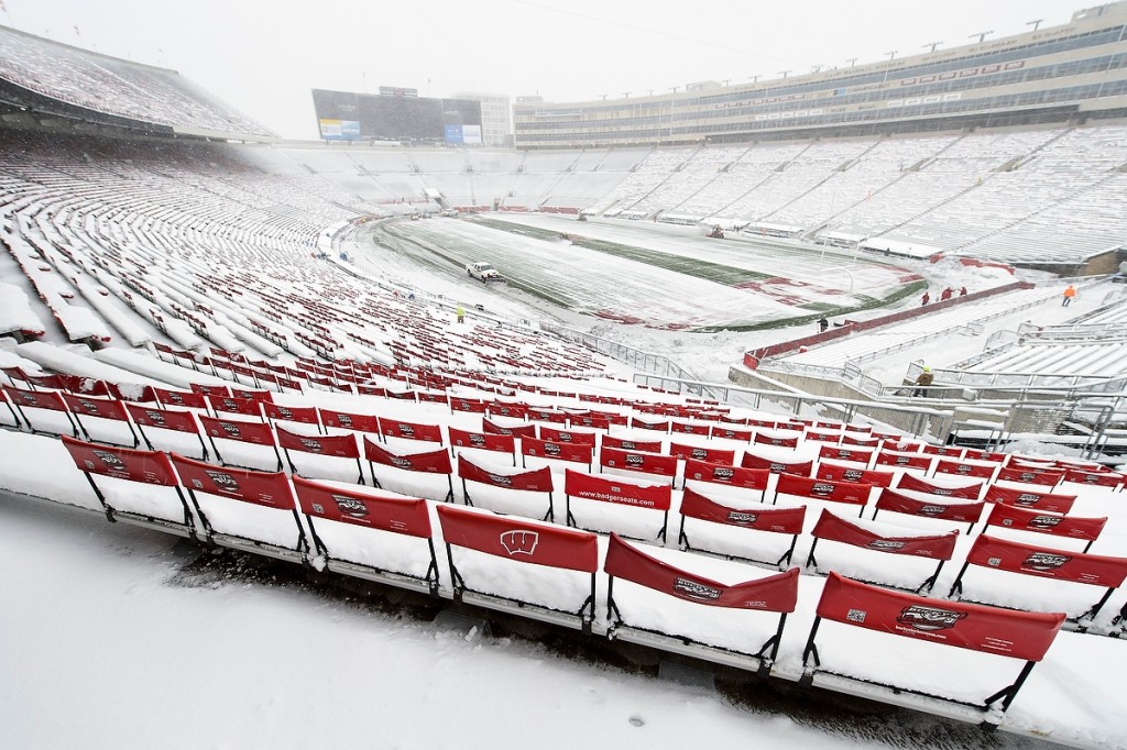 Mother Nature meets Wisconsin football as UW Athletics staff clear the outcome of a November snowstorm before the Badgers’ final home game at Camp Randall Stadium.