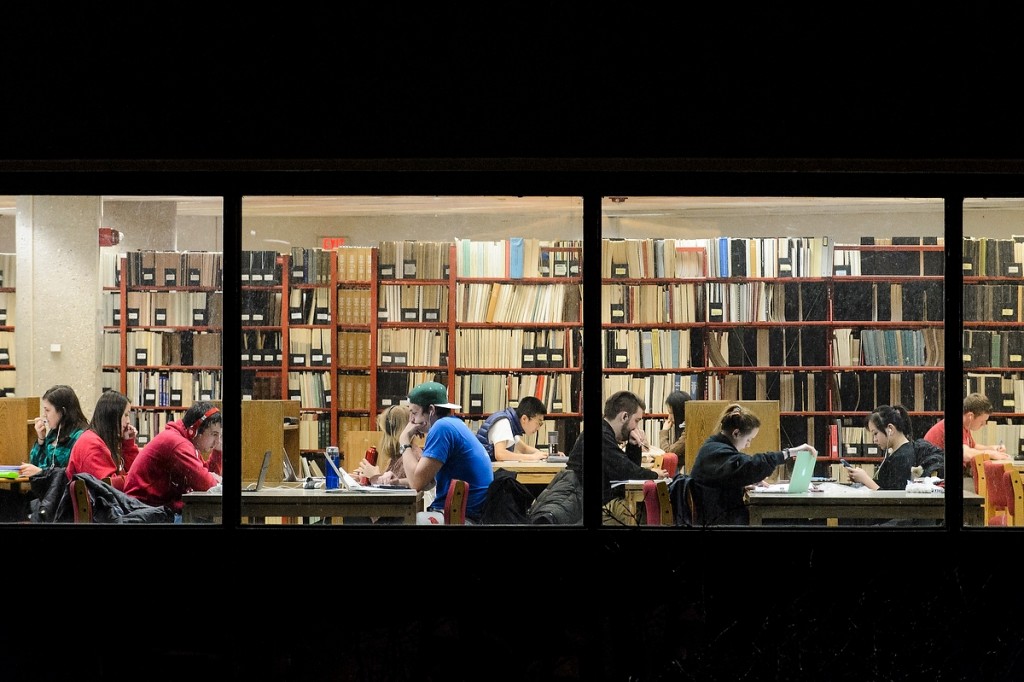 Students hunker down inside Wendt Library to study for final exams.