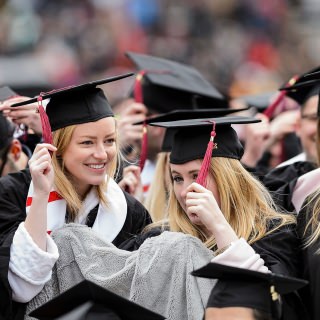 Graduates move their tassels from right to left as they pass from student to graduate.