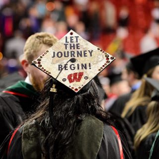 Graduates put their creativity on display with decorated mortarboards during Friday's ceremony.