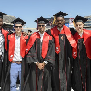 Graduating members of the UW men's basketball team - from left, Nigel Hayes, Zak Showalter, Jordan Hill, Vitto Brown and Bronson Koenig – with coach Greg Gard.