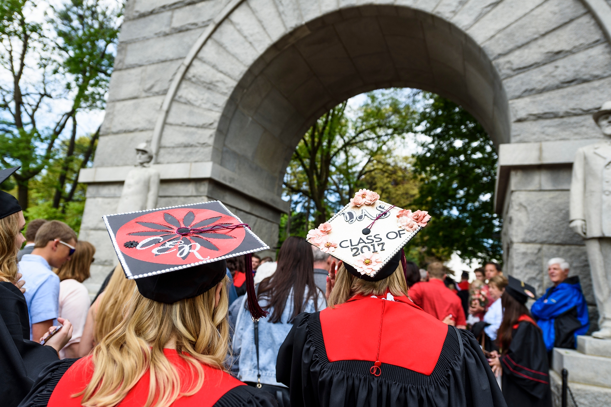 Many graduates chose to make a grand entrance through the Camp Randall Memorial Arch.