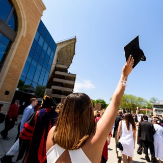 Soon-to-be graduates enter Camp Randall Stadium before Saturday's ceremony.