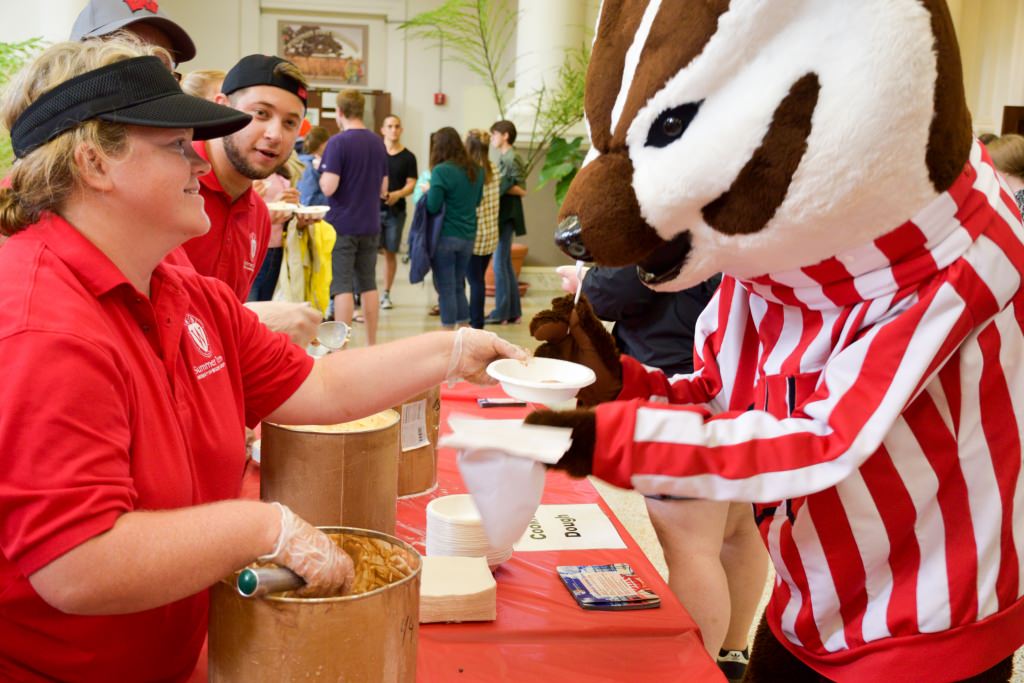 On Wednesday, July 12 the Summer Term staff hosted an ice cream social for students, faculty and staff. Celebrating the thriving environment on campus this summer, the team dished out 45 gallons of Babcock Dairy ice cream to more than 1,000 guests, joined by Bucky Badger and the UW marching band. (Photo by David F. Giroux)