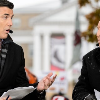 Photo of commentators Rece Davis and Lee Corso sharing their game predictions.