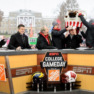 Photo of Corso drawing cheers from the crowd by picking Wisconsin to defeat Michigan.