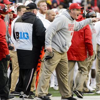 Photo of head coach Paul Chryst letting the referees know his feelings about a call.