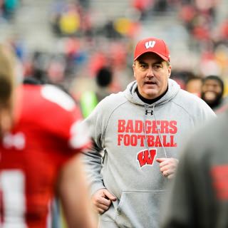 Wisconsin Head Coach Paul Chryst runs off the field following the Wisconsin Badger's 24-10 football victory over the Michigan Wolverines at Camp Randall Stadium at the University of Wisconsin-Madison on Nov. 18, 2017. (Photo by Jeff Miller / UW-Madison)